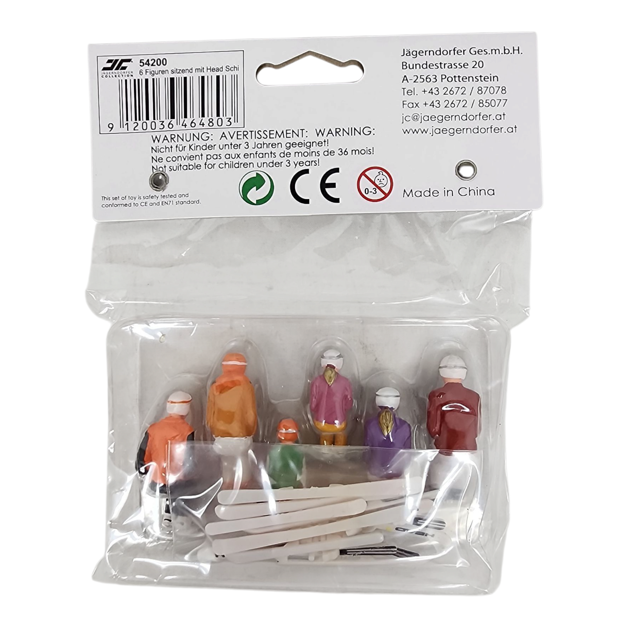 6 Piece sitting figurines with Skis - Orange/Purple