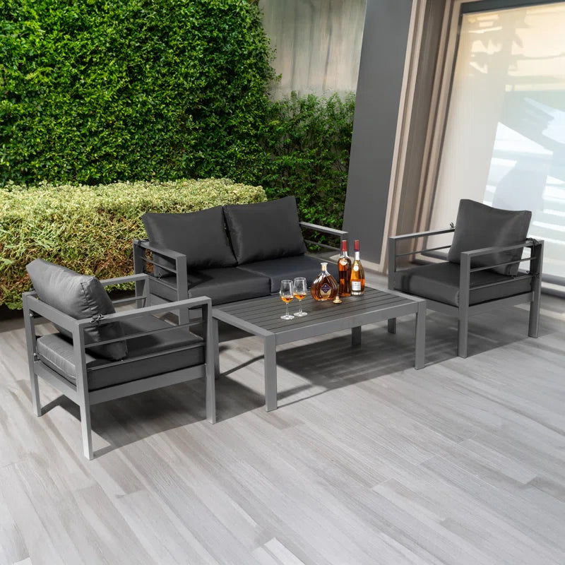 Outdoor Four Piece Patio Conversation Set With Cushions