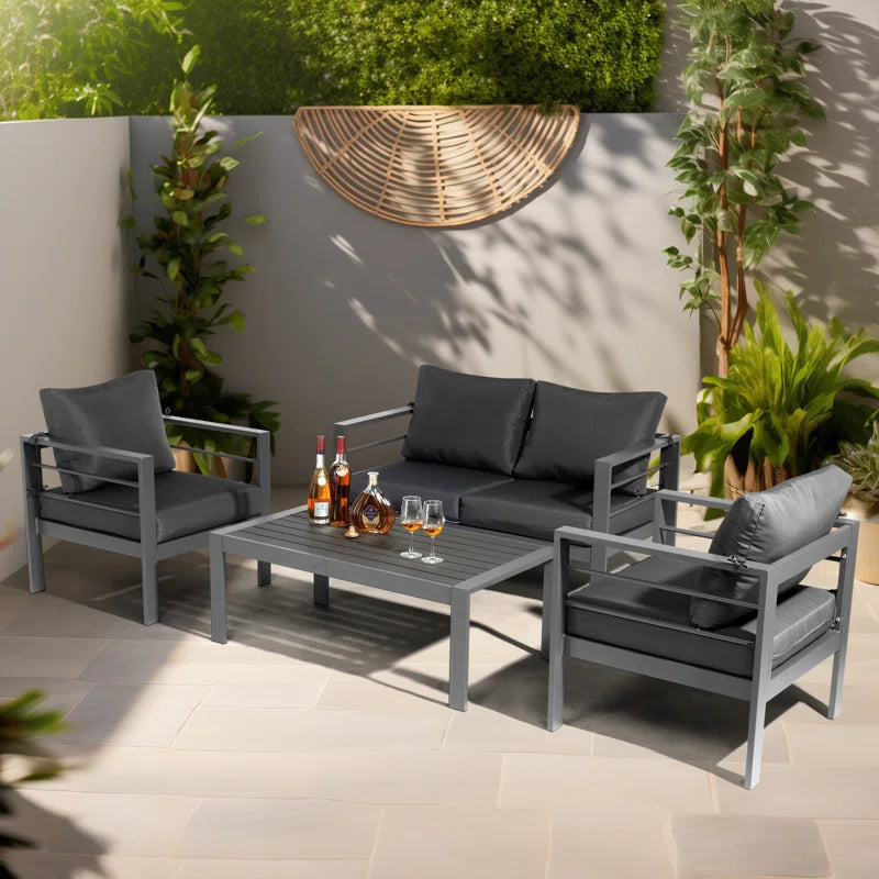 Outdoor Four Piece Patio Conversation Set With Cushions