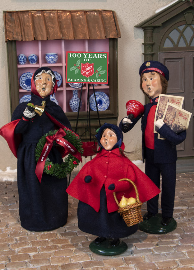 Salvation Army Carolers - Woman with Wreath