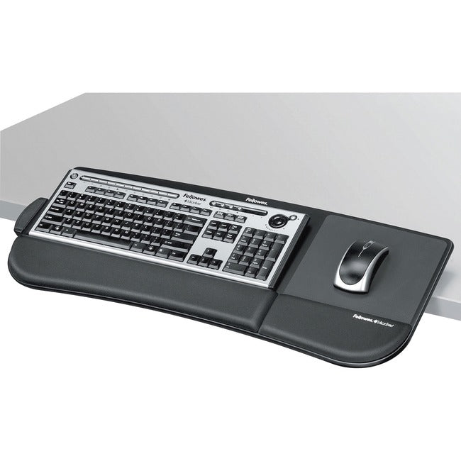 The Fellowes Tilt N Slide Keyboard Manager Attaches To Your Desktop Edge Without